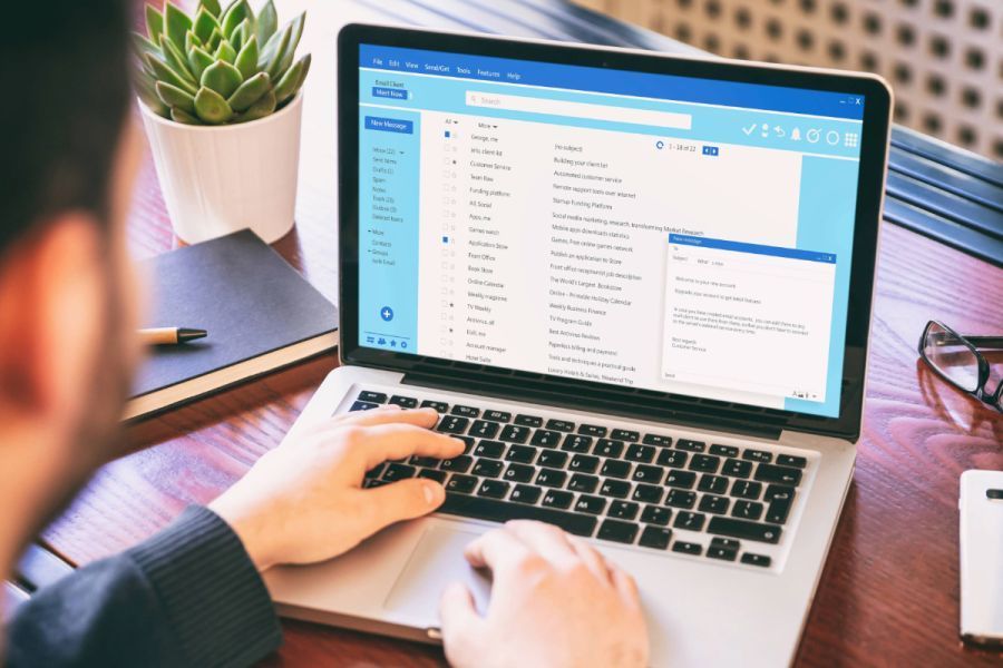 man-looking-at-email-on-computer